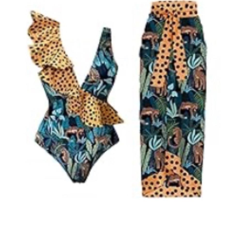 Sexy, classy, and attention getting one piece swimsuit with matching cover up!